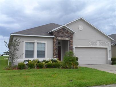Photo of 5588 SYCAMORE CANYON DRIVE, KISSIMMEE, FL 34758